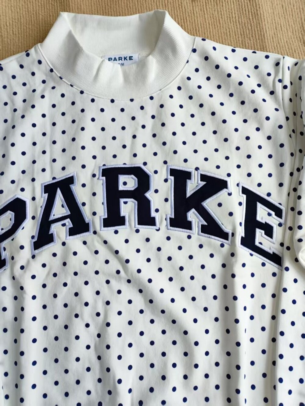PARKE Varsity Blue Polka Dot Mock Neck Sweatshirt - Picture 2 of 7